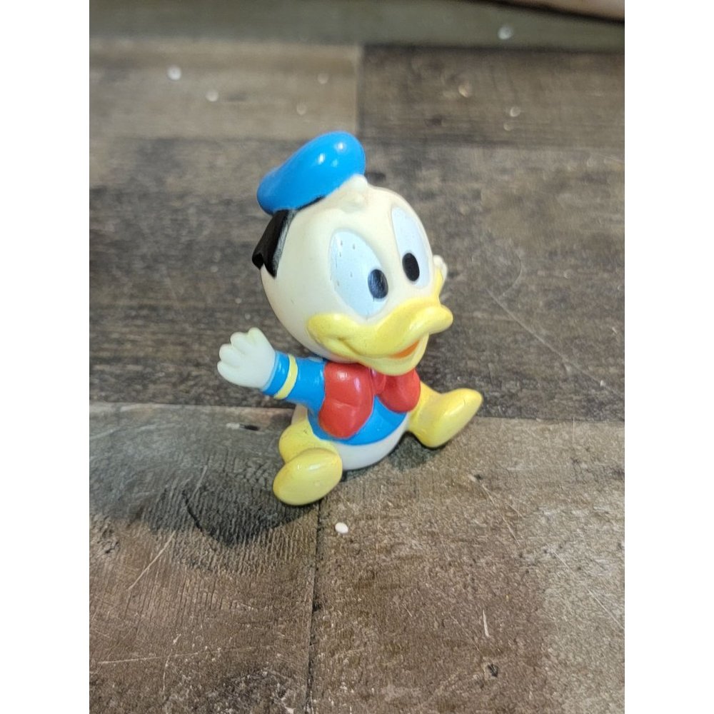 Baby Donald Duck smiling hug toy figure Disney